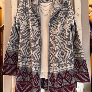 Almost Famous Geometric/Aztec patterned cardigan.Blue, ivory and Burgundy NWOT!